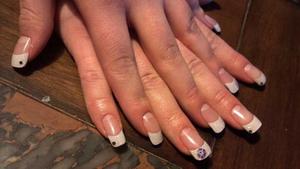 French Tip Acrylic nails built with CND Acrylic + sparkle added, swarovski crystal & flower accents.