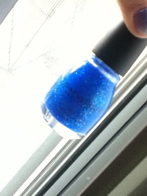 blue glittery nails look the best ;D