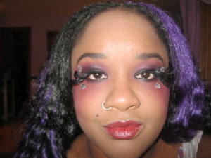 My first attempt at a burlesque look. It needed something more but not sure what yet. When I do it again, I will try different eye lashes.