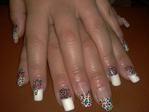 acrilic nails by me with a colourful animal print