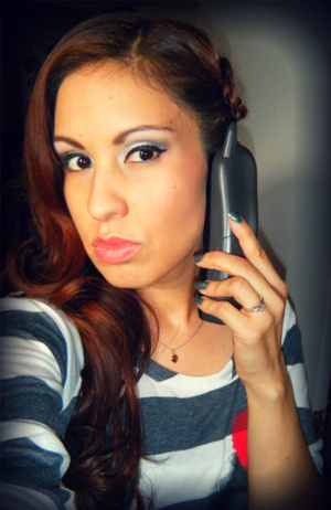 The Maybelline eye tattoo is in white, I love it very much especially with silver like I wore today. Lip butter is in Peach Parfait, the only nude color I really love on me. Here I was on the phone with my Sis :)