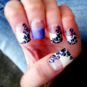 Purple/bluish glitter leopard print. 
-I got acrylics done at the salon and then painted them at home.