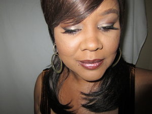 Was taken back to the 70's.  A long shag, hoop earrings and rich brown makeup.  Sweeping lashes complete the look.