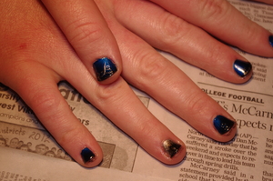 On a friend's nails.  Blue, with black fading over top.  Ring fingers are silver w/ black fading over top.
