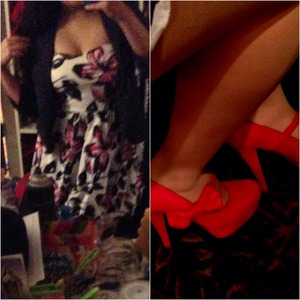 Short red white and black dress with Grey cover up and red stilettos with cute red bow