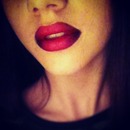 Dramatic, deep red lip with subtle ombré