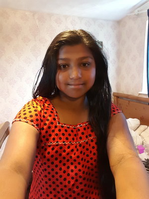 Tharunisa E.