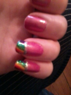 one of the kids i work with wanted me to paint my nails pink with rainbows so i did <3 