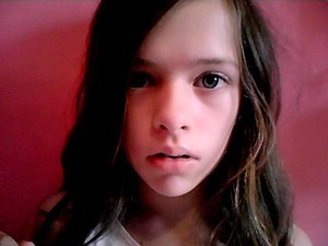 I'm really bored so I started plaing round my make-up.
I used a New Vid lipgloss called Coconut Ice, a body shop eyeshadow pallete and some Miss Sporty clear mascara x