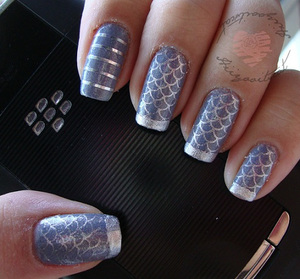 I used Mash nail plates the 2nd set for 12.99 on my nails as well as some nail art tape from ebay.