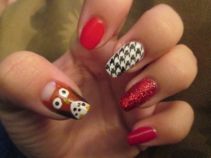 This is a little bit of everything. I based my design on red. A nice owl, then a bright red nail, than a pattern nail, full glitter and then a deep red bloody nail polish. I love the way this looks together. Soon on my blog: http://nailartbylynn.tumblr.com/