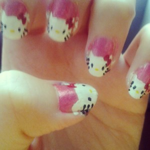 pink nails with hello kitty faces 