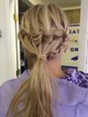 it's a waterfall and then with the left over hari frim the waterfall i did a snake braid. Then pulled it up into a ponytail 