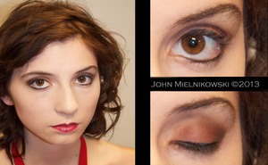 A very classic but dynamic look I did for a photo shoot. Started off with a warm shimmering brown with a reddish undertone; added a deeper blackened brown in the outer corner & blended inward. I then added a highlight to the brow & the inner corner of the eye & lined the top & bottom lids. Then did a simple skin treatment by covering any blemishes or discoloration with concealer and powered the face for a light coverage. added a matte contour & highlight and finished off with a fruit punch colored lip gloss