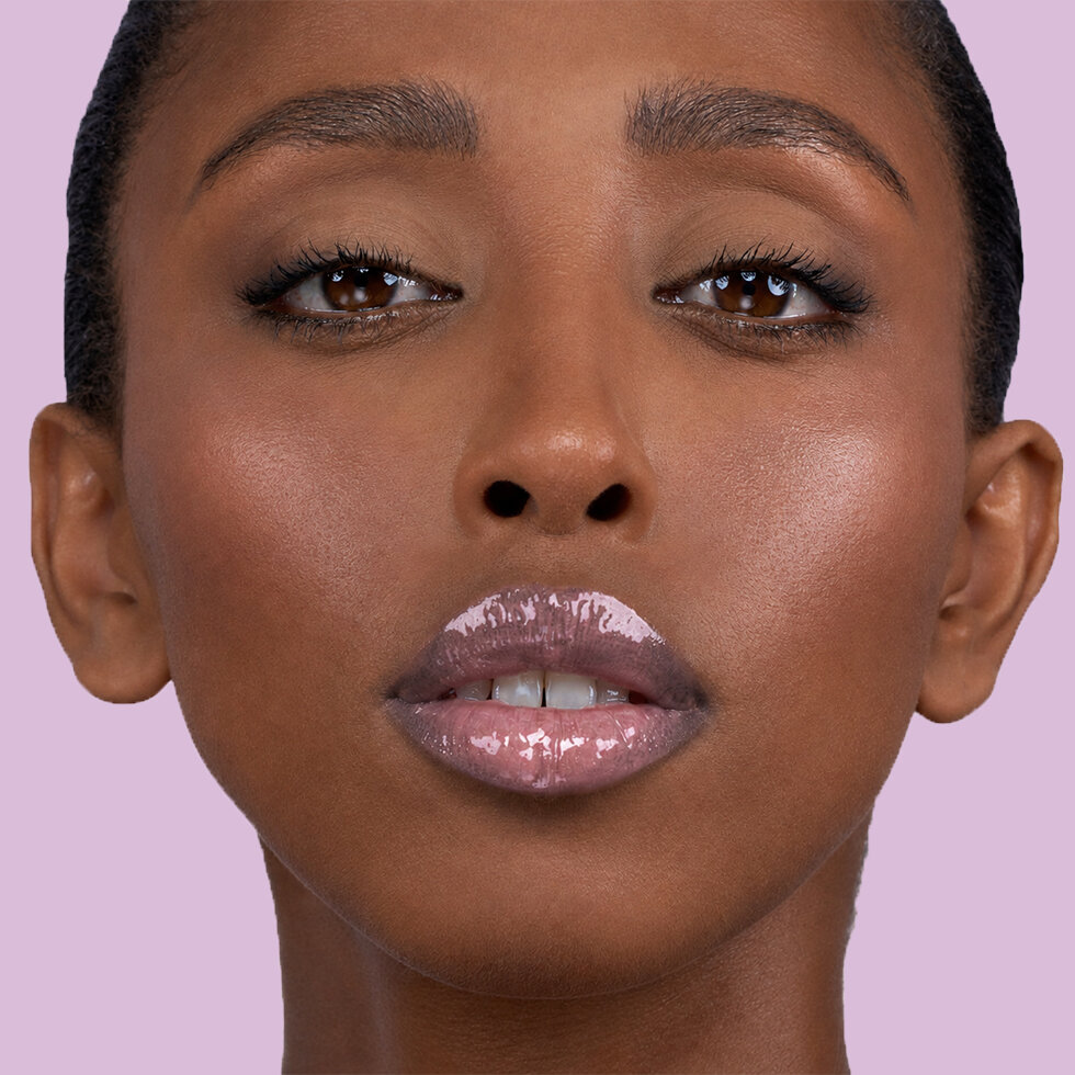 Natasha Denona model wearing the HY-GLOSS Lip Set in Lush Lila