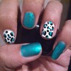 Shimmery Cheetah print nails. 