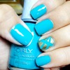 Turquoise and gold "laser" accent
