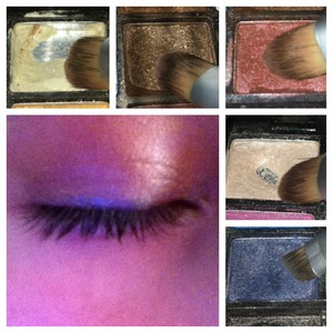 Cream on lid, medium brown in crease, rust in outer corner and browbone, cream in inner corner, and navy at lash line 