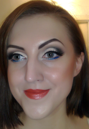 Pin Up with a twist: http://www.staceymakeup.com/2011/12/tutorial-pin-up-look.html
