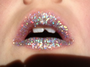 I love glitter so I put it on my lip