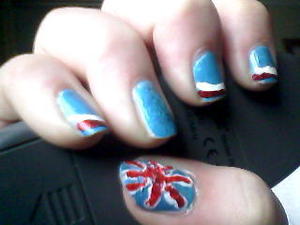 I know this pic is a wee bit late  but I was inspired by a girl on beutylish but i changed some , I  added a glitter nail and glittery nail polish and a red diamond in the middle of the union jack but this isnt a really good pic , sorry !