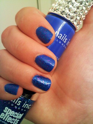 I love blue, and Nails Inc Baker street is my favorite color right now. I used that first than the special effects #D glitter polish from the same brand. It's called connaught square. 