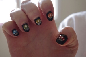 The Super Mario Mushrooms!!  On my friend's nails.