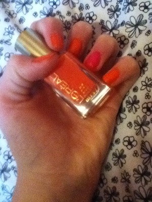 I used loreal nail color in tangerine crush and a pink piggy paint nail polish
