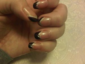 Angular tips in Avon's NAILWEAR PRO in Midnight Plum; detailed with Kiss Nairl Art Paint in SPZ31 Pearl Gold plus Bling accent.
