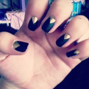 Black matte with gold triangle.