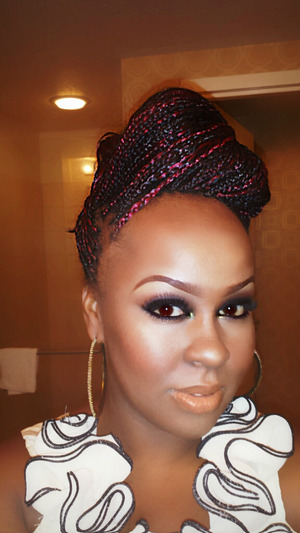 Went out with the ladies and styled my braids in an updo faux hawk paired with a smokey eye and nude lip. 