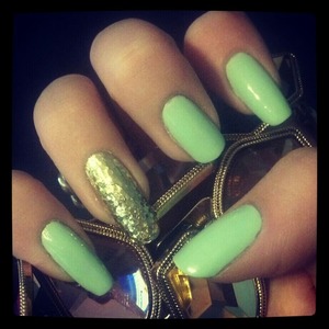 The Colors used in this mnnicure are Sally Hansen Mint Sorbet, Orly Luxe, and Milani Jewel FX Gold.  :)