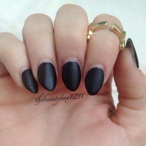 Matte black stiletto nails 