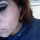 Burgundy,Whte And Black Crease With Black And Gold Winged Liner