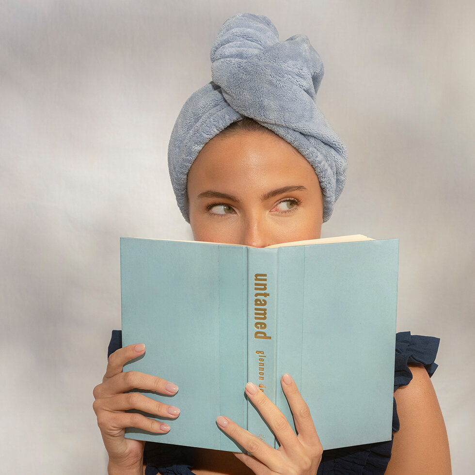 Model using Kitsch Plush Microfiber Hair Towel Turban