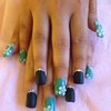 Green and black acrylics with 3d flowers