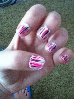 I just used 3 different colors a stripe brush then a top coat to finish