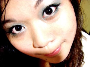 Playing with my Green Eyes shadow from Elianto Cosmetics. :)