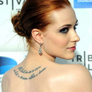 Evan Rachel Wood sporting a gorgeous typographic tattoo on her back