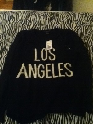Here I got this "Los Angeles" sweater from Forever 21 and ad you may not notice that there are little rips in the sweater which makes the sweater even more cuter! (Not a big deal, it's designed to have rips lol 😜) 
Price: $22.80