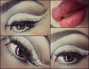 A modern take on the pin-up look w/ a red ombre lip. I used a liquid liner for the dots.
