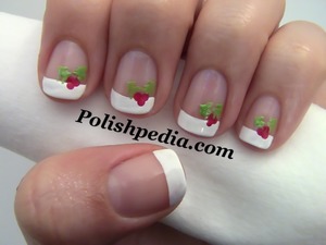 A simple way to do french manicures for Christmas.

Watch My Video Tutorial @ http://polishpedia.com/christmas-holly-nail-art.html