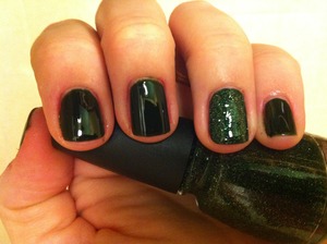 Finger paints tough art to follow with china glaze winter holly accent nail seche clear base and seche vite topcoat 
