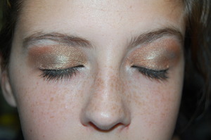 While at the beach, my cousin took advantage of my love for makeup- which was fabulous! I kept it simple for the beach, yet glamorous because we were going out to dinner. I covered her lid in a copper toned shadow and then buffed in a light green crease. No liner, thin mascara. 