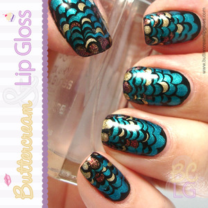 Dragon Scales Manicure

Tutorial: http://buttercreamlipgloss.com/post/21794335416/dragon-scales-manicure-tutorial-ive-received