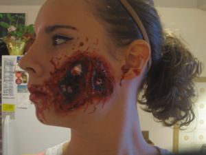 Hole-in-the-Head makeup by me on Skye, my little baby sister:)