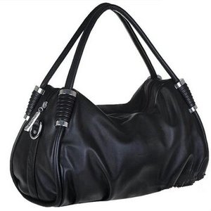 Soft "leather" ...roomy with silver hardware....comes with shoulder strap....an aliexpress find.