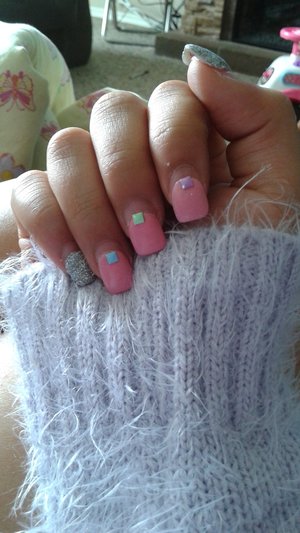 Simple nail design I created for spring using pastel colors and some glitter. 
