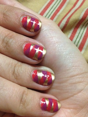 This look is best with high contrast colors, I used: Autumn orange, purple and metallic gold polish. 