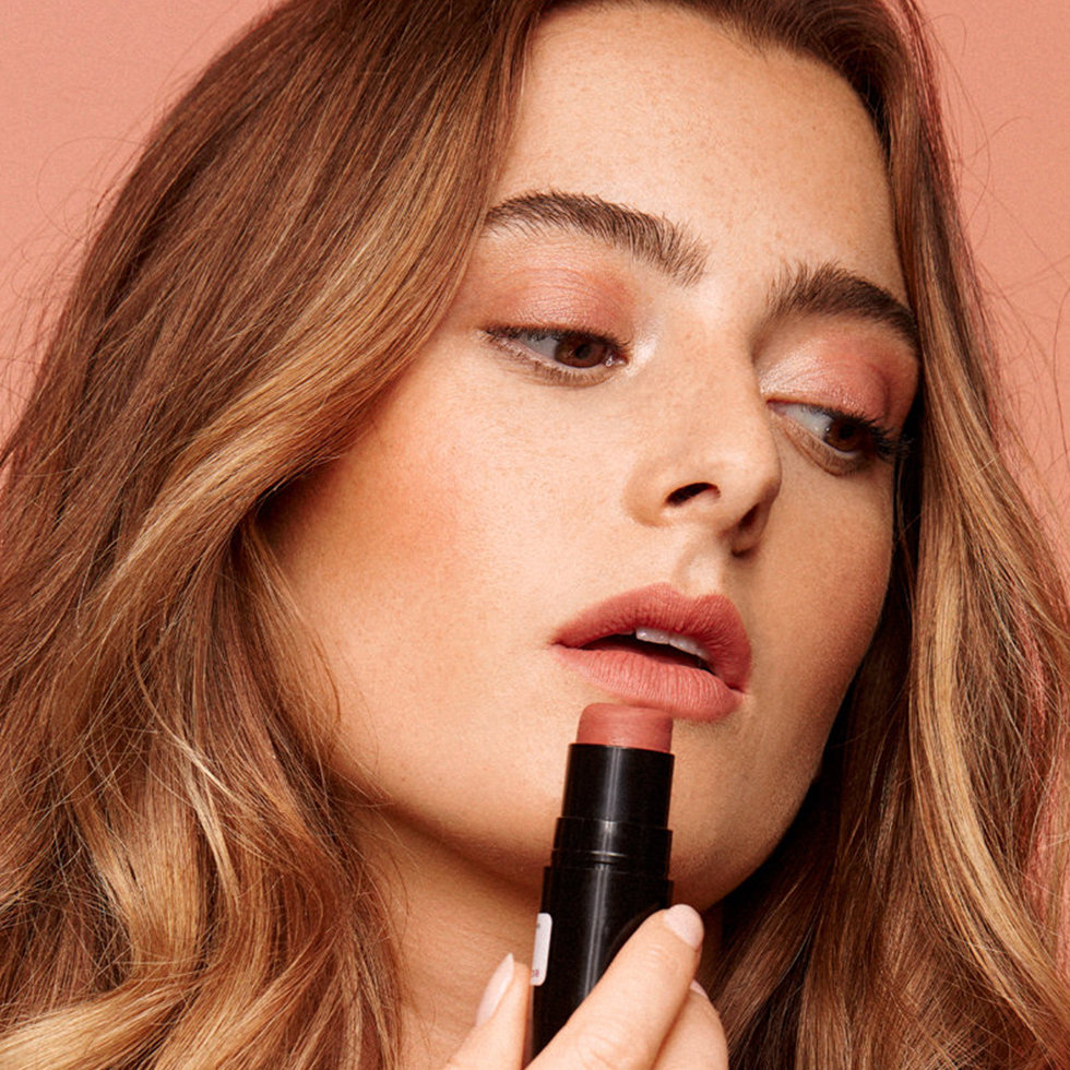 Nudestix model wearing the Nudies Bronze in Beach Babe